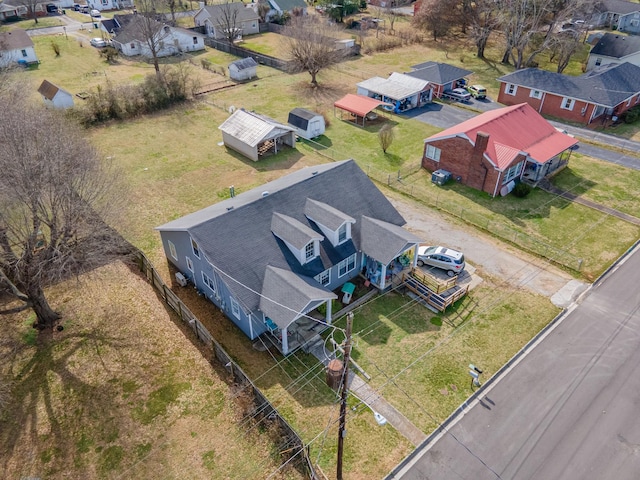 birds eye view of property with a residential view