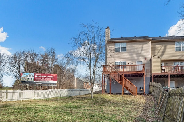 exterior space featuring a fenced backyard, stairs, and a deck