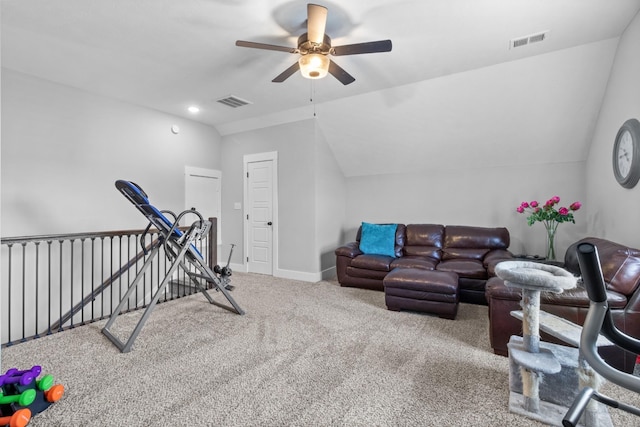 workout area with a ceiling fan, visible vents, vaulted ceiling, and carpet flooring