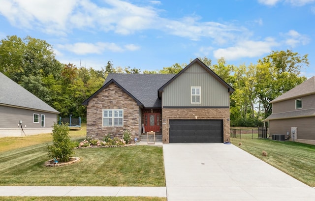 view of front facade with an attached garage, cooling unit, brick siding, concrete driveway, and a front yard