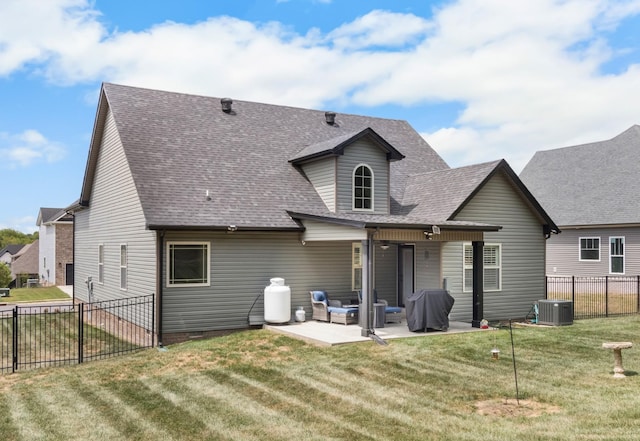 back of property with crawl space, a patio area, fence, and a yard