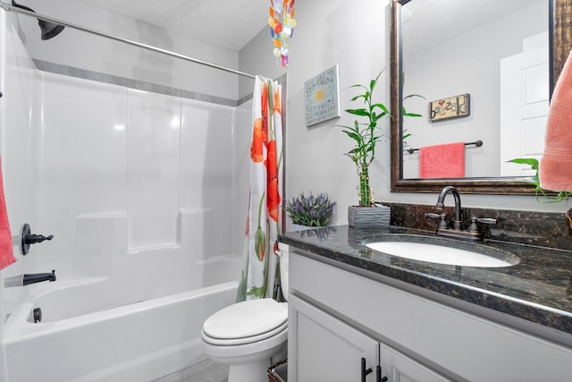 full bathroom featuring shower / tub combo, vanity, and toilet