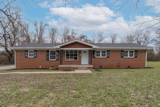 ranch-style house with roof with shingles, brick siding, crawl space, and a front lawn