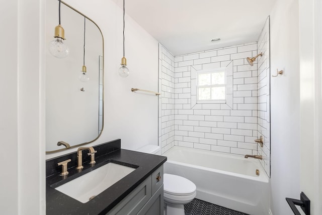 full bath featuring tub / shower combination, vanity, and toilet