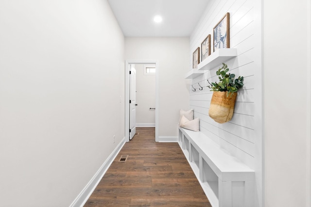 mudroom featuring dark wood-style floors, baseboards, and recessed lighting