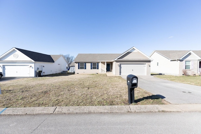 ranch-style house with an attached garage, concrete driveway, and a front yard