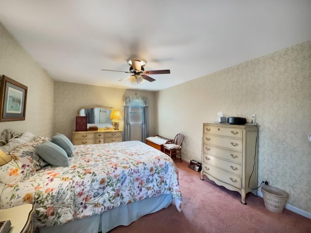 bedroom with carpet, ceiling fan, baseboards, and wallpapered walls