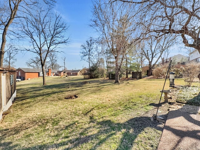 view of yard featuring a residential view