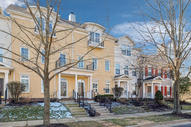 view of property featuring a chimney