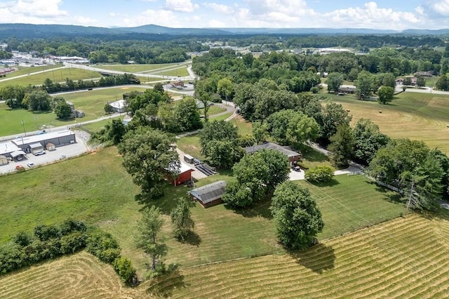 birds eye view of property featuring a rural view