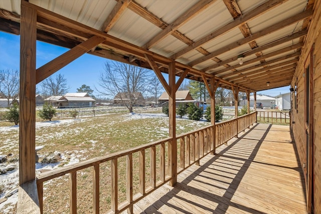 view of snow covered deck