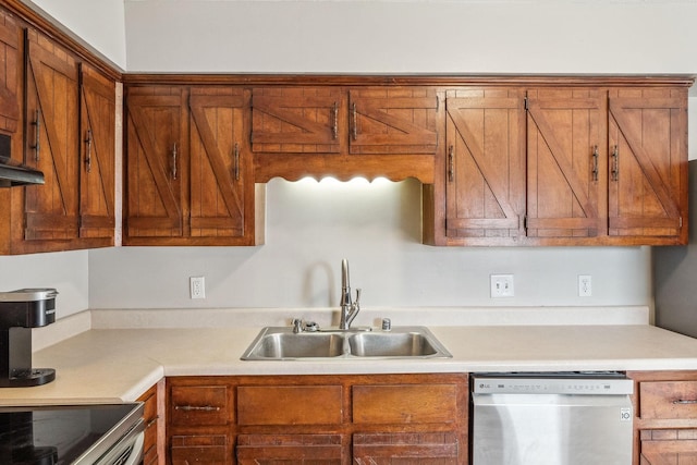 kitchen with brown cabinets, dishwasher, light countertops, and a sink