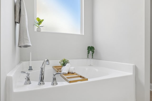 full bathroom featuring a garden tub