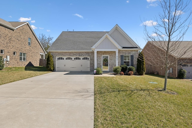 craftsman inspired home with a garage, concrete driveway, board and batten siding, and a front yard