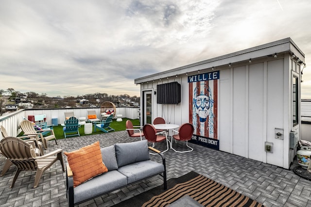 view of patio / terrace featuring outdoor dining area and an outdoor hangout area