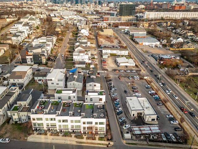 birds eye view of property with a city view