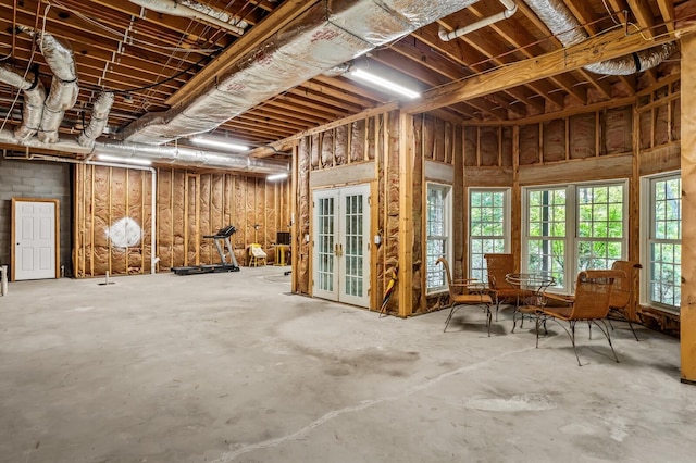 miscellaneous room with unfinished concrete floors