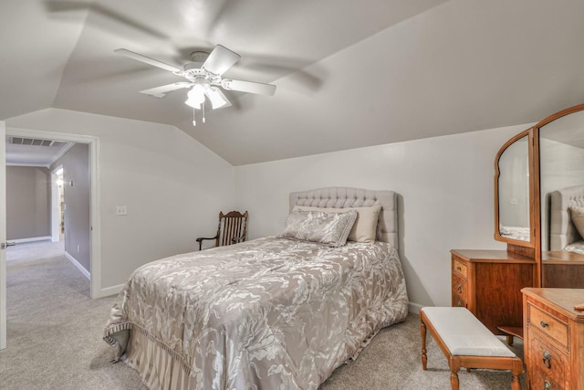 bedroom with lofted ceiling, ceiling fan, light carpet, visible vents, and baseboards