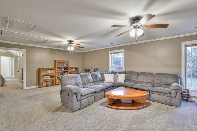 living area with light colored carpet, visible vents, attic access, ornamental molding, and baseboards