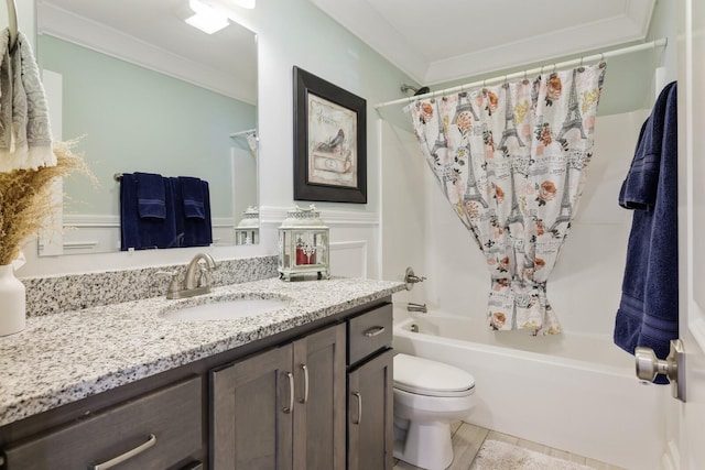 full bathroom featuring ornamental molding, shower / bathtub combination with curtain, vanity, and toilet