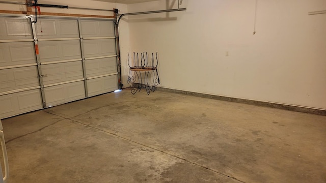 garage featuring baseboards