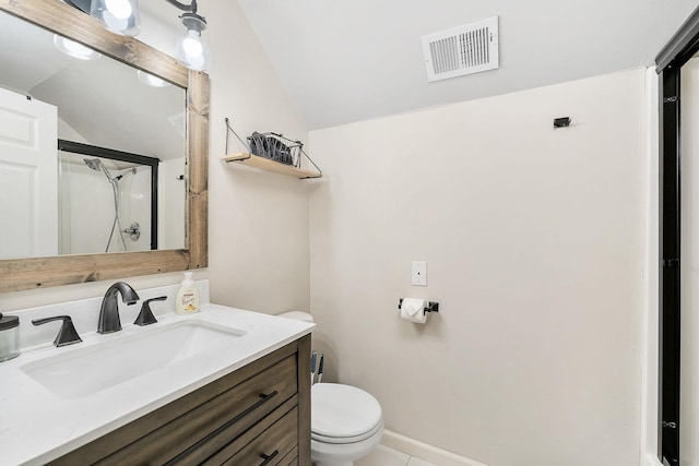 bathroom with visible vents, lofted ceiling, a shower with door, toilet, and vanity