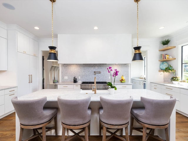 kitchen featuring white cabinets, decorative backsplash, open shelves, and dark wood-style flooring