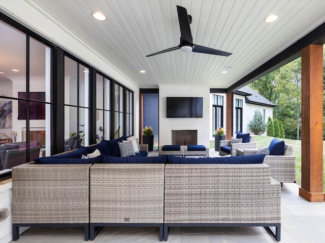 living area featuring a large fireplace, wooden ceiling, a ceiling fan, and recessed lighting