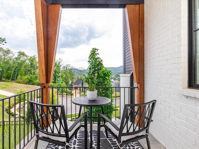 balcony featuring a mountain view