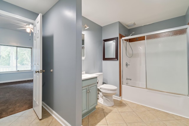 full bath with toilet, ceiling fan, enclosed tub / shower combo, tile patterned flooring, and vanity