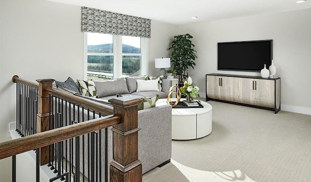 living area with carpet, baseboards, and recessed lighting