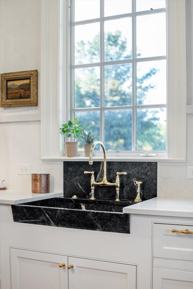 room details with a sink and backsplash