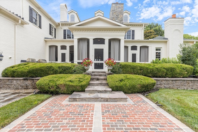 exterior space featuring a chimney