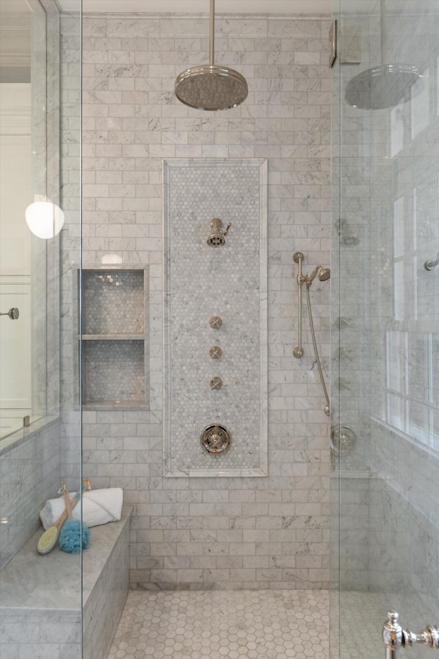 full bathroom featuring a shower stall