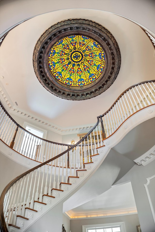 stairs with a towering ceiling