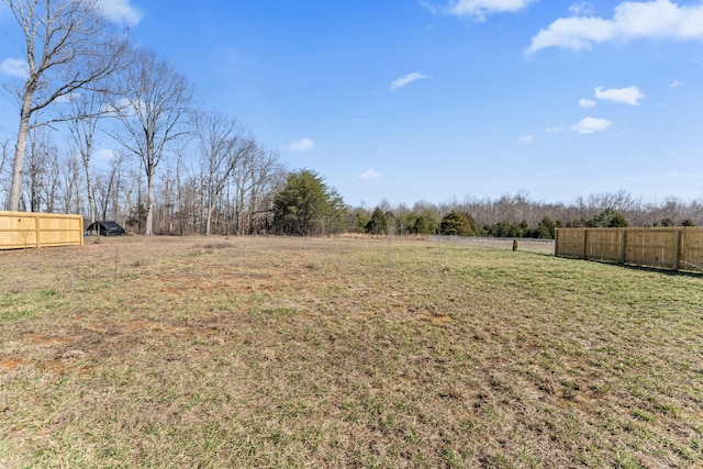 view of yard featuring fence