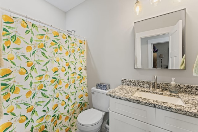 full bath featuring curtained shower, vanity, and toilet