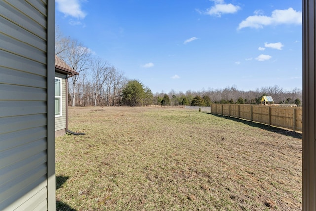 view of yard with fence