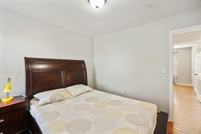 bedroom featuring light wood-type flooring