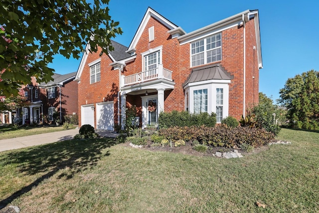 view of front facade featuring a balcony, a garage, brick siding, concrete driveway, and a front lawn