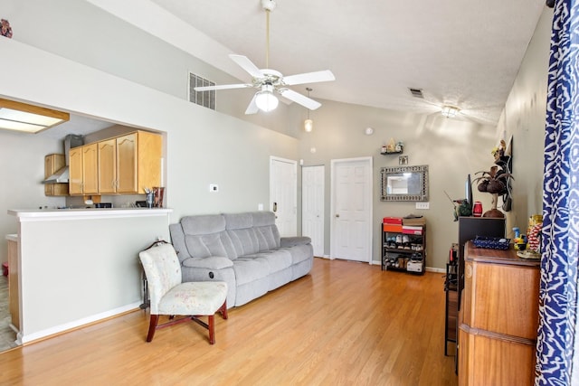 living area featuring light wood-style floors, ceiling fan, visible vents, and baseboards