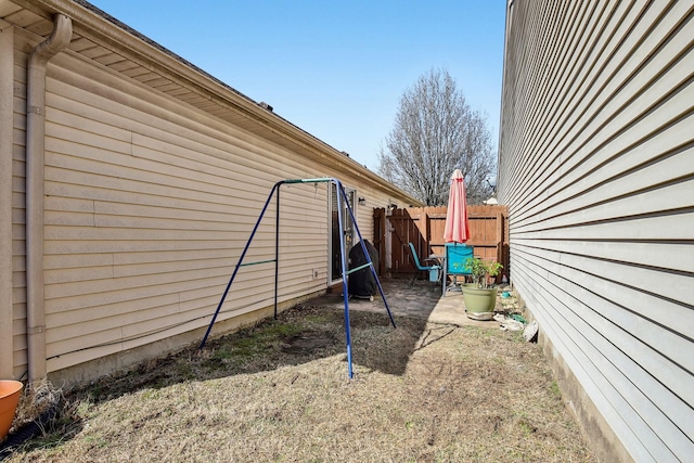 view of yard with a patio area and fence