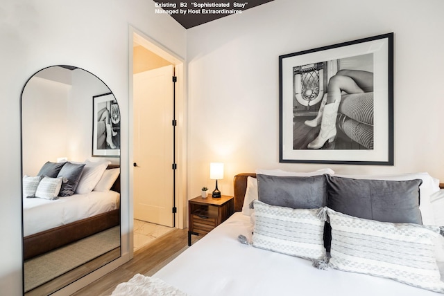 bedroom with light wood-style flooring