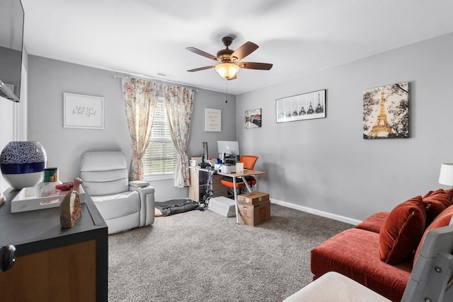 office area featuring carpet, baseboards, and ceiling fan