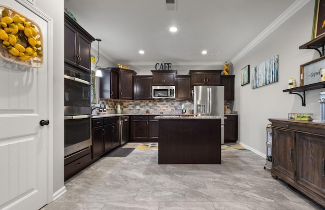 kitchen with dark brown cabinetry, stainless steel appliances, a kitchen island, light countertops, and pendant lighting