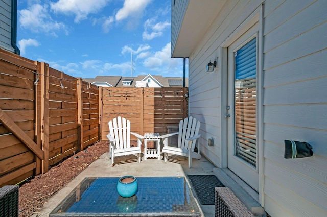 view of patio / terrace with fence