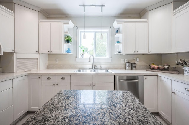 kitchen with white cabinets, decorative light fixtures, a sink, open shelves, and stainless steel dishwasher