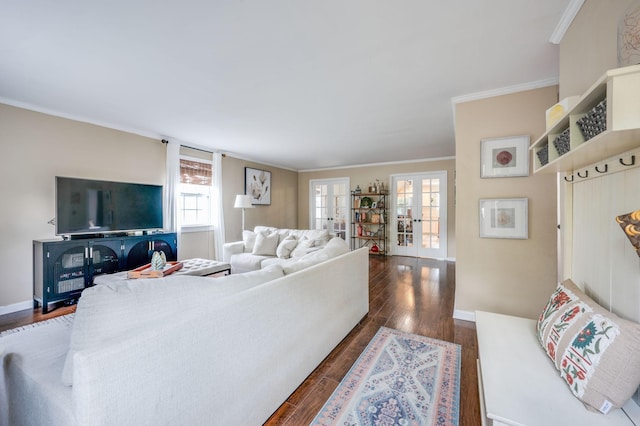 living room featuring baseboards, ornamental molding, dark wood finished floors, and french doors