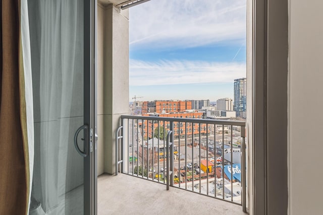 balcony featuring a city view