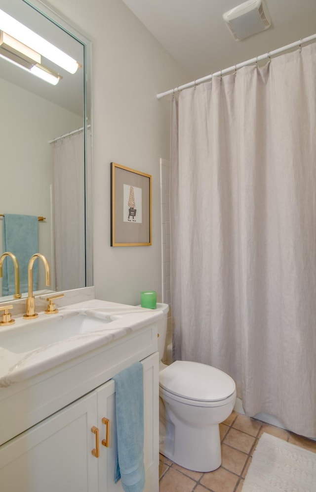 full bath with curtained shower, visible vents, toilet, vanity, and tile patterned flooring